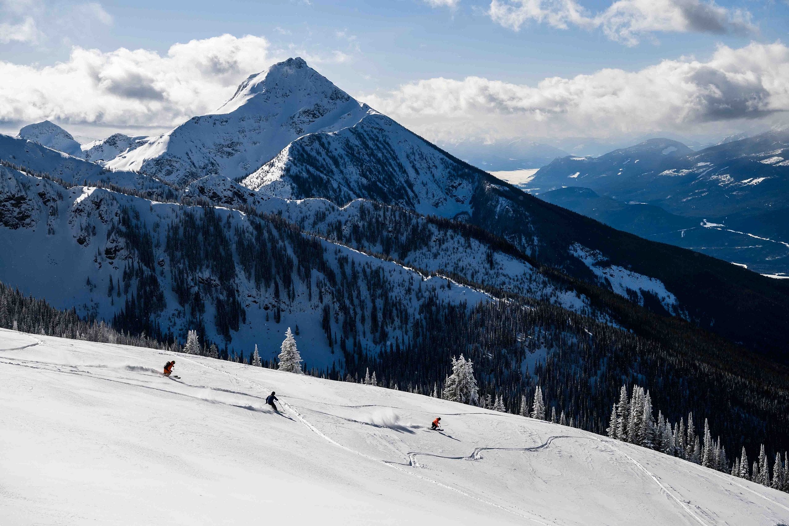 A trio of skiers at Revelstoke Mountain Resort