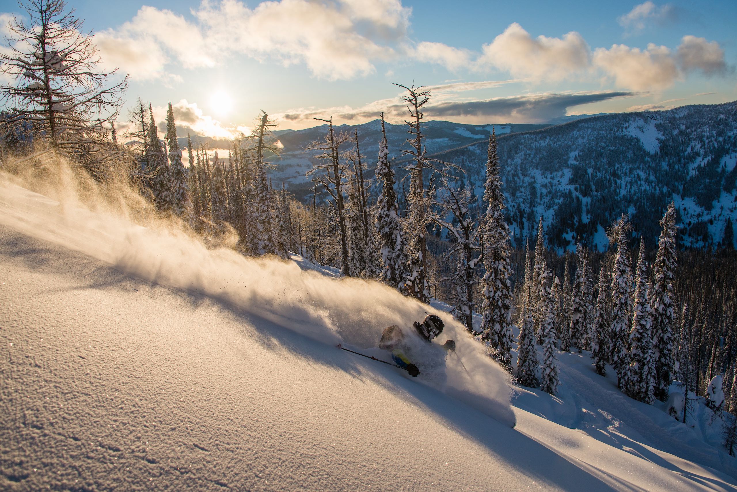 Skiing through powder at Whitewater Ski Resort