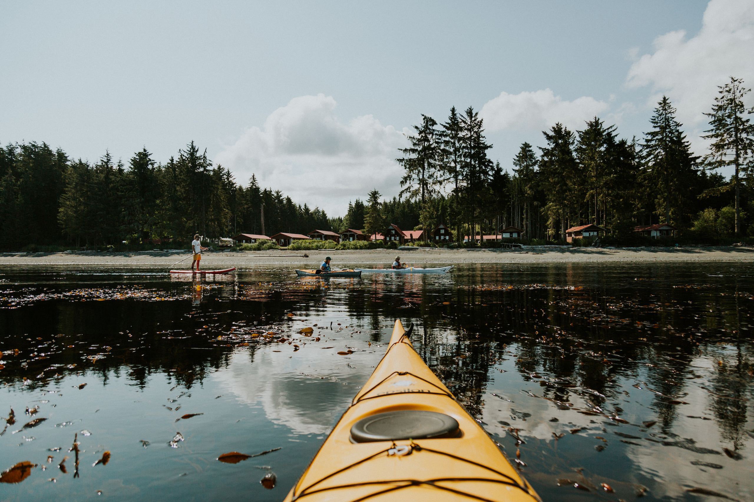 People canoeing on a lake