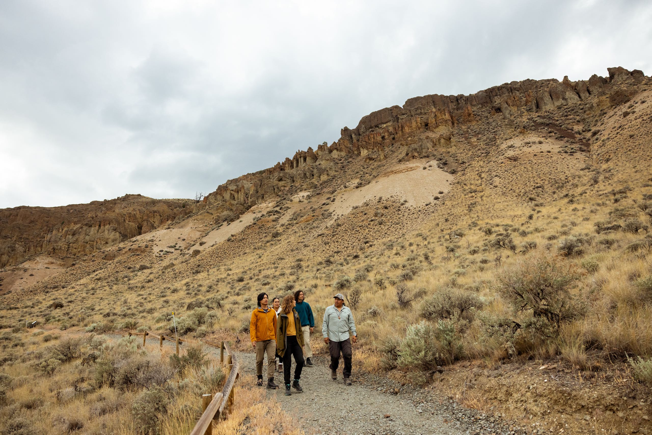 A group of friends on a tour of McAbee Fossil Beds near Cache Creek - home to fossils that date back over 50 million years.