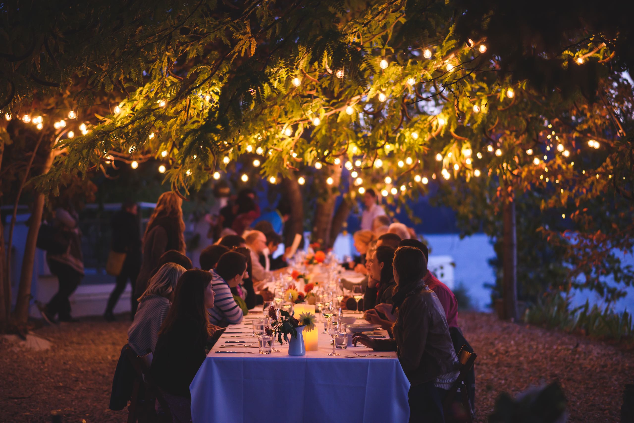 Friends dining at God's Mountain Estate
