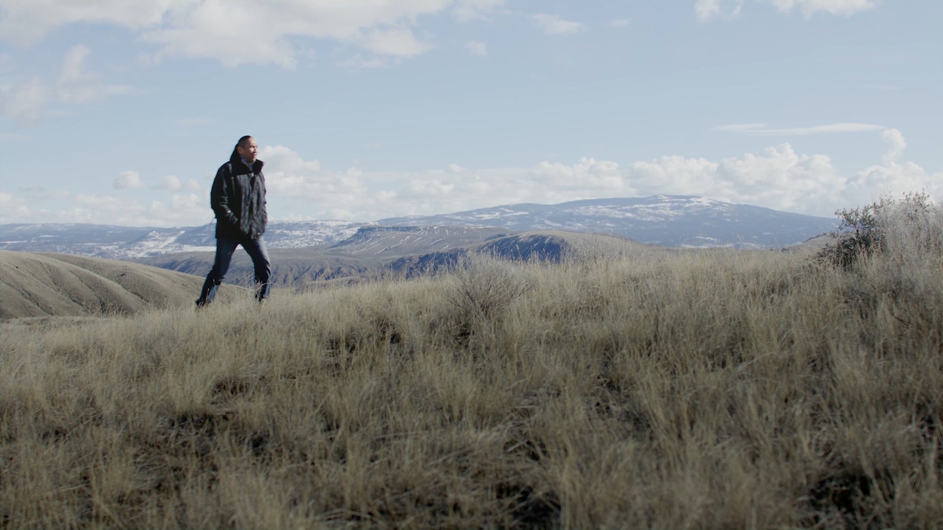 A man walking on a mountain in BC