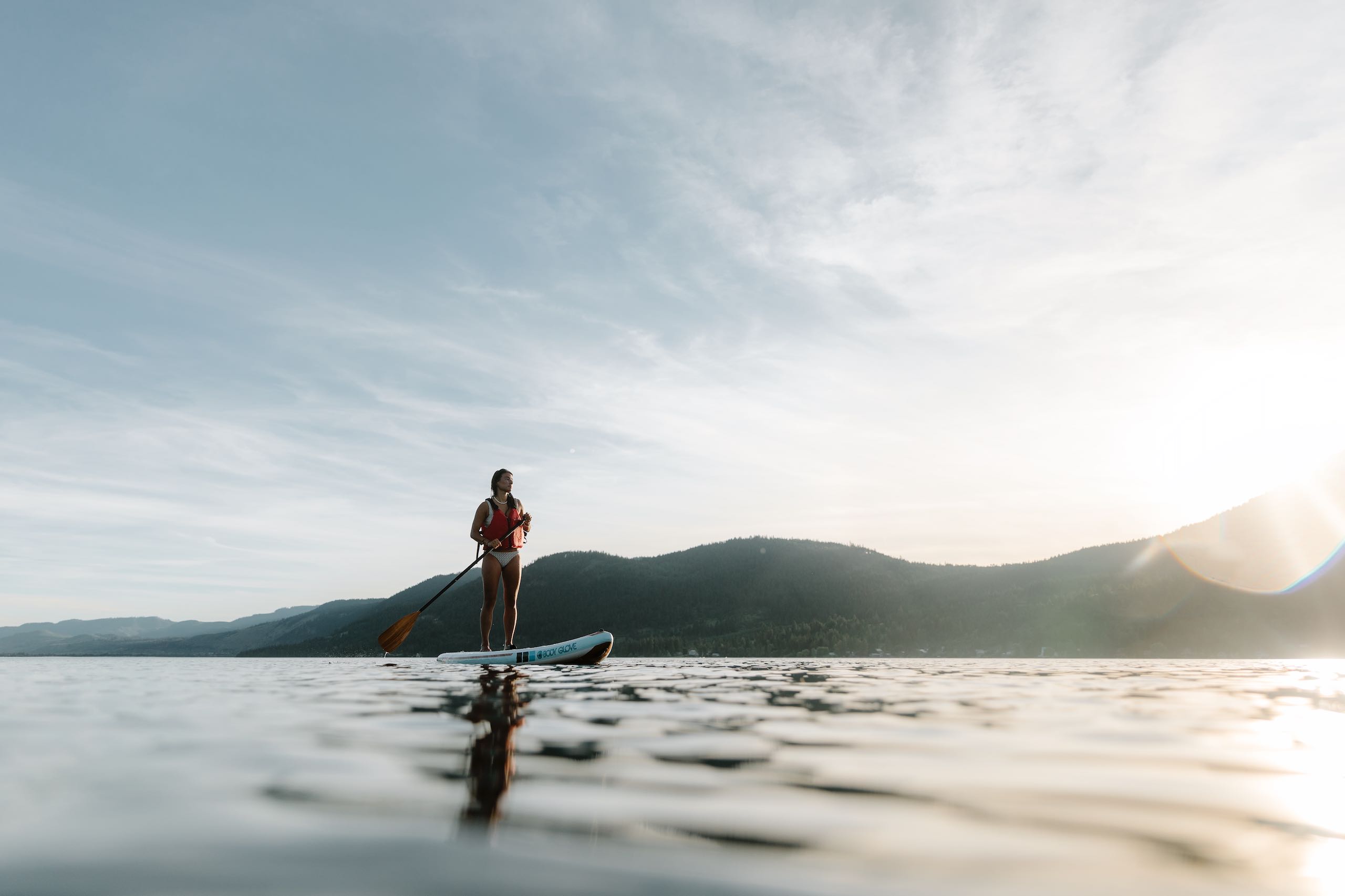 Stand-up Paddleboarding on Little Shuswap Lake, in front of Quaaout Lodge & Spa